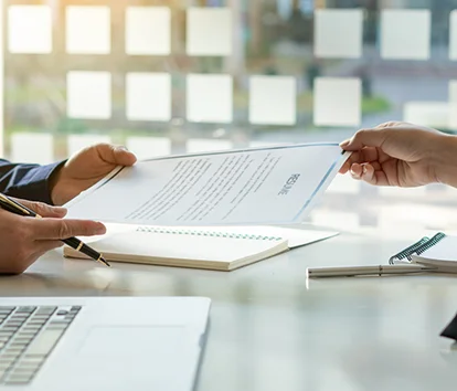 an official paper document chaging hands